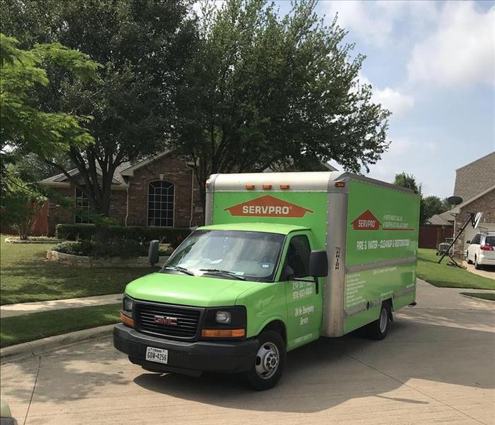 SERVPRO Truck in front of a house
