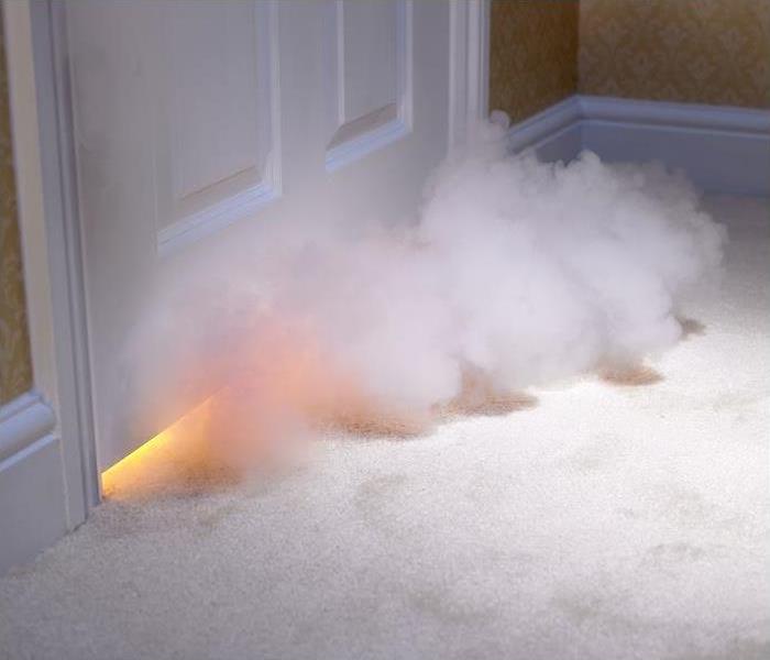 smoke entering room through bottom of door