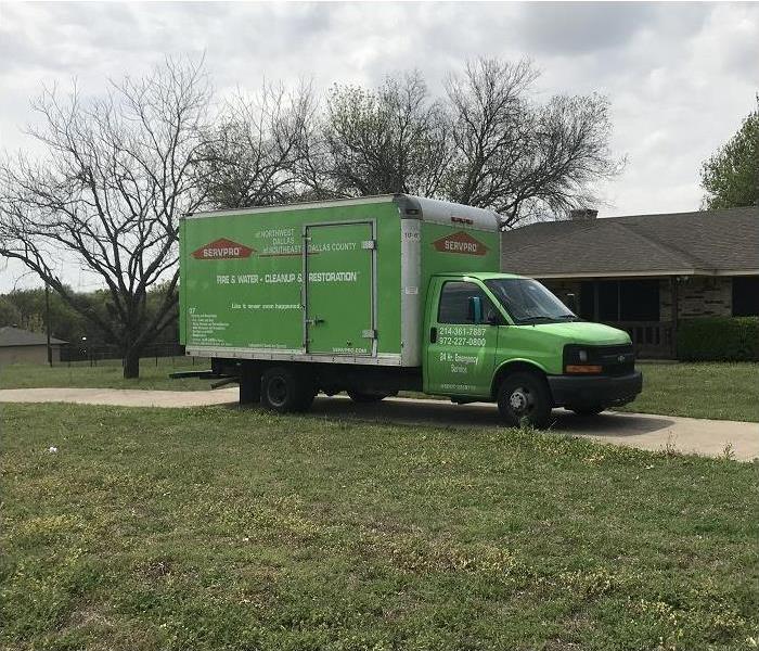 SERVPRO vehicle in front of home