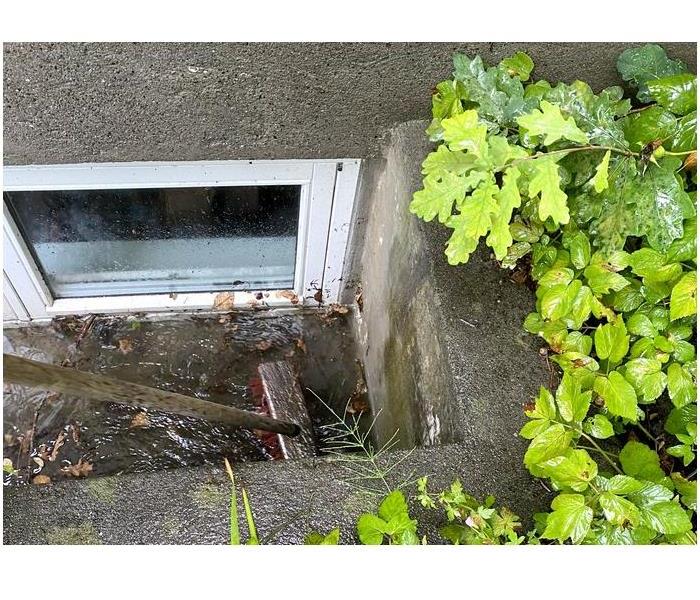 Basement entrance with water damage